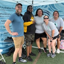 Stephen Thomas with the Vital Flow team at the event
